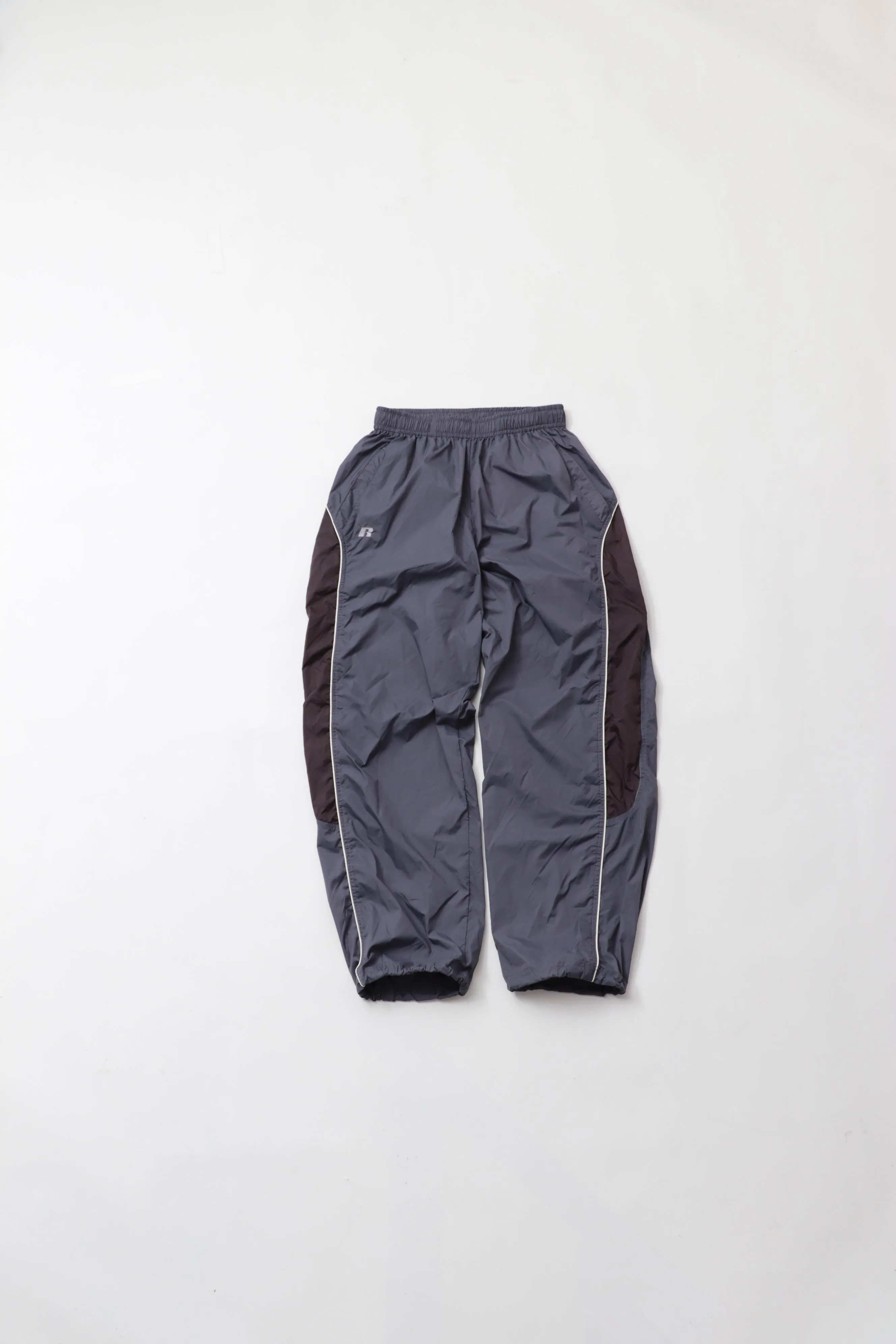 NYLON TRAINING PANTS＜RC-24746＞ BLUE×GUNMETAL　【RUSSELL ATHLETIC】