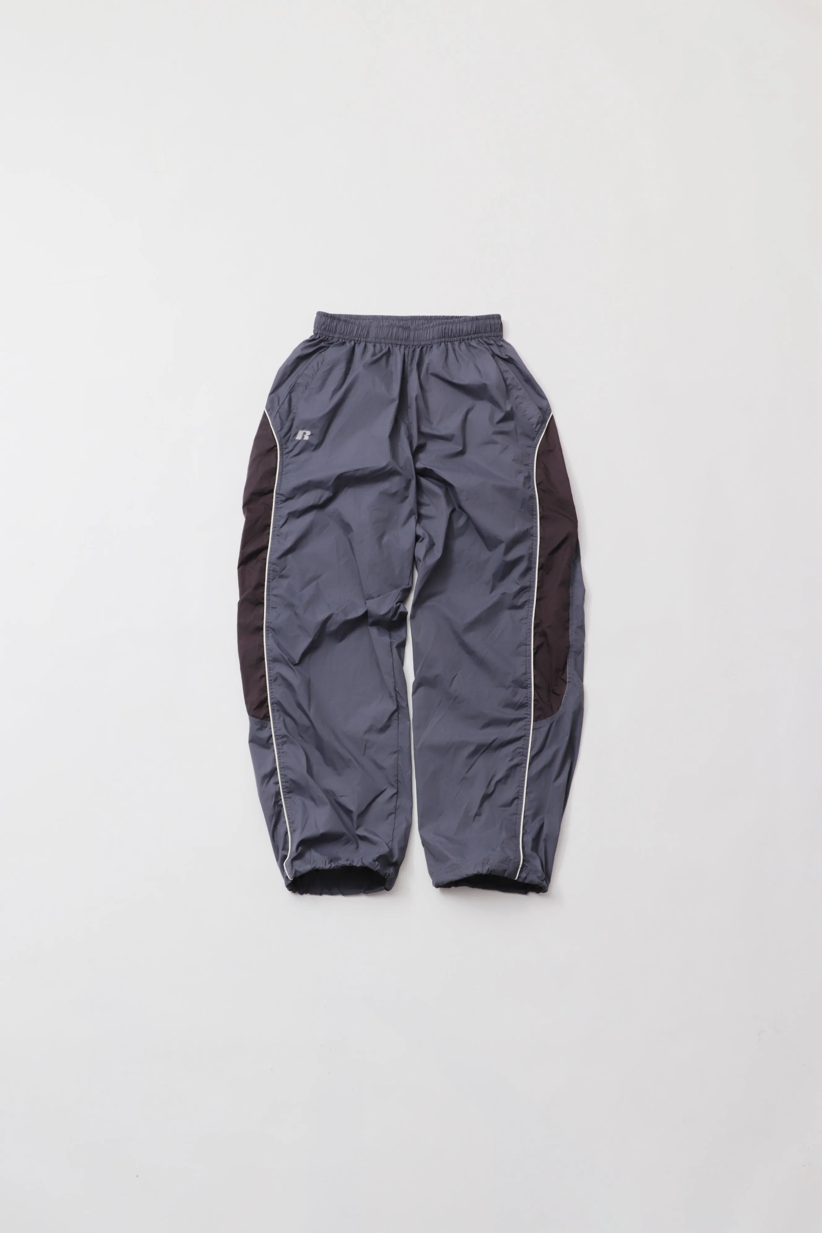 NYLON TRAINING PANTS＜RC-24746＞ BLUE×GUNMETAL　【RUSSELL ATHLETIC】